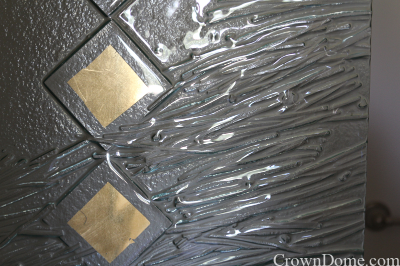 Gilded glass detail on the kiln formed cast architectural glass