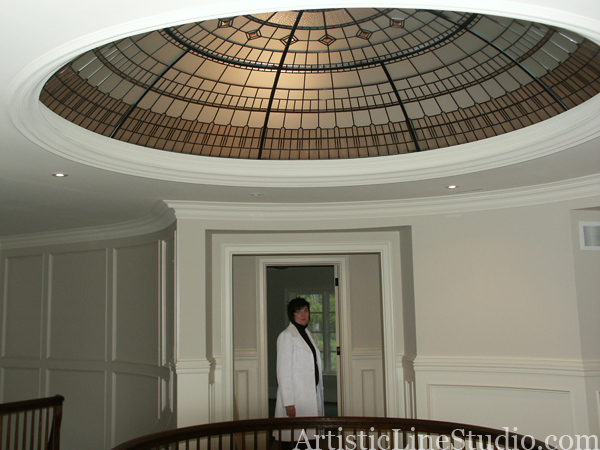 stained and leaded glass dome with jewels and beveled glass with moldings