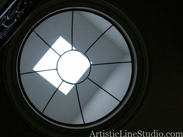 stained and leaded glass dome with jewels and beveled glass before glass installation