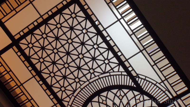 English Manor style decorative glass skylight detail with colored beveled, ecid etched and chinchilla bronze glass