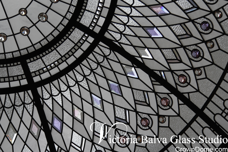 Colored custom made bevelled glass acanthus with crystal jewels for a large leaded glass dome