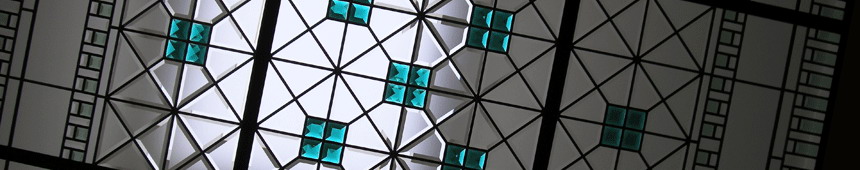 Stained and leaded glass skylight with emerald crystal lewels and custom beveled glass, English manor style